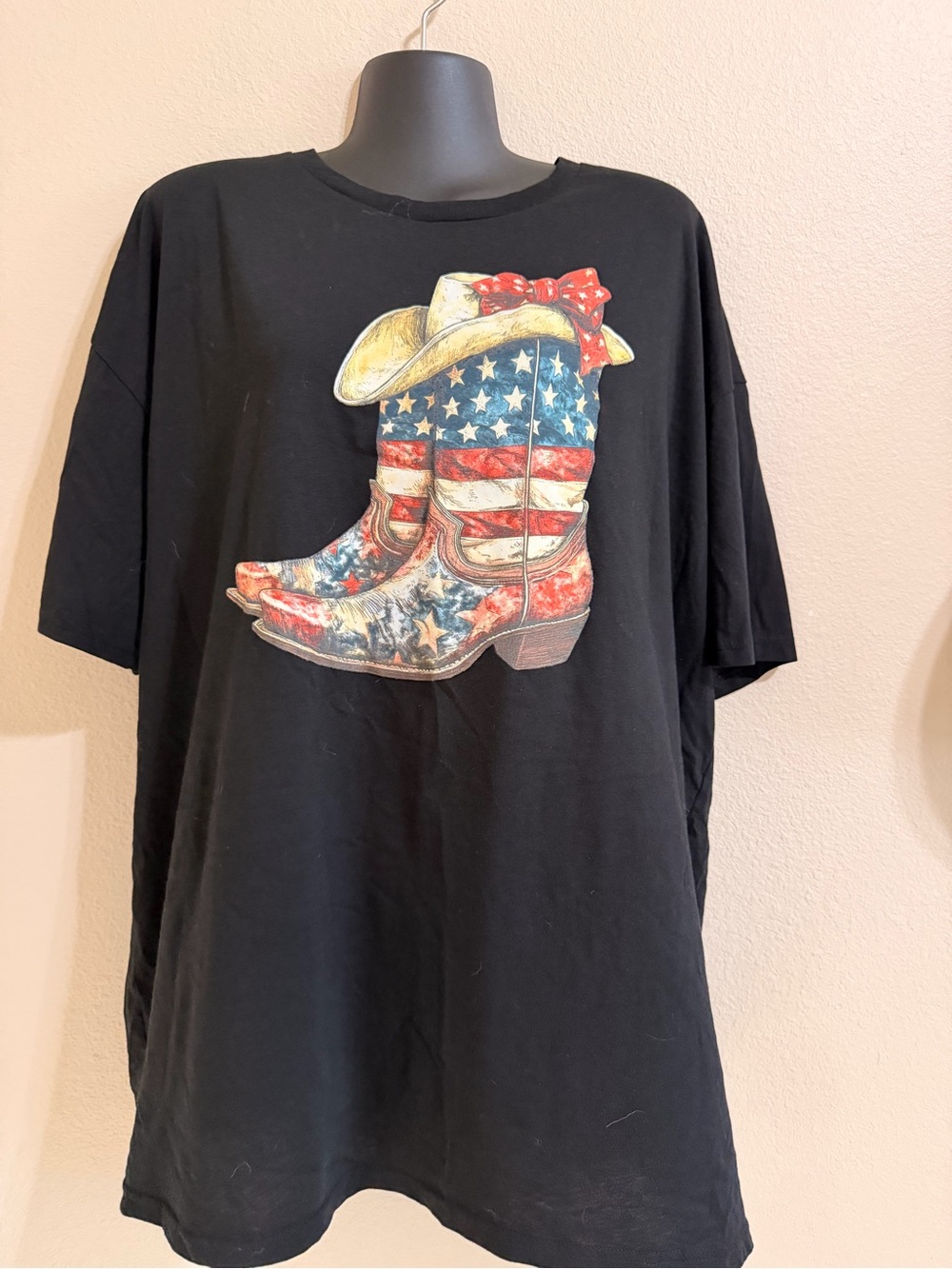 Black Short-Sleeve Women’s Tee with Patriotic Cowboy Boots Graphic